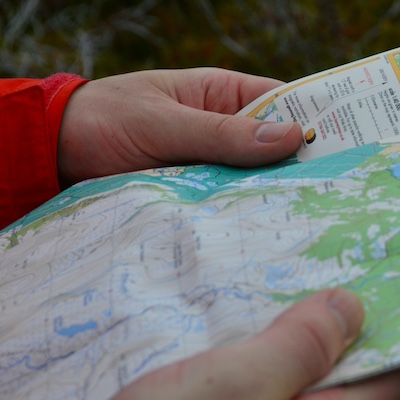 a hiker with a map